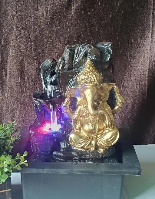 Ganesh water fountain Decorative Showpiece for home and office.