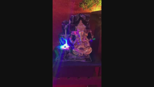 Ganesh water fountain Decorative Showpiece for home and office.